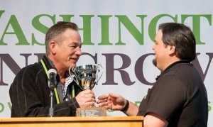 Jim McFerran, left, receives the Erick Hanson Memorial Winegrape Grower of the Year Award. (TJ Mullinax/Good Fruit Grower)