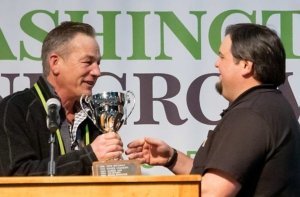 Jim McFerran (left) receives the Erick Hanson Memorial Winegrape Grower of the Year Award at the 2019 Washington Winegrowers Association convention and trade show on Thursday, Feb. 14. (TJ Mullinax/Good Fruit Grower)