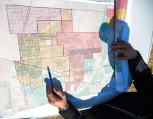 Tim Weidert shows the map of Weidert Farm near Touchet, Washington, highlighting potential growing zones and the current wind drainage of the property on September 29, 2017. This site is part of over 6,000 acres for sale by Weidert. (TJ Mullinax/Good Fruit Grower)