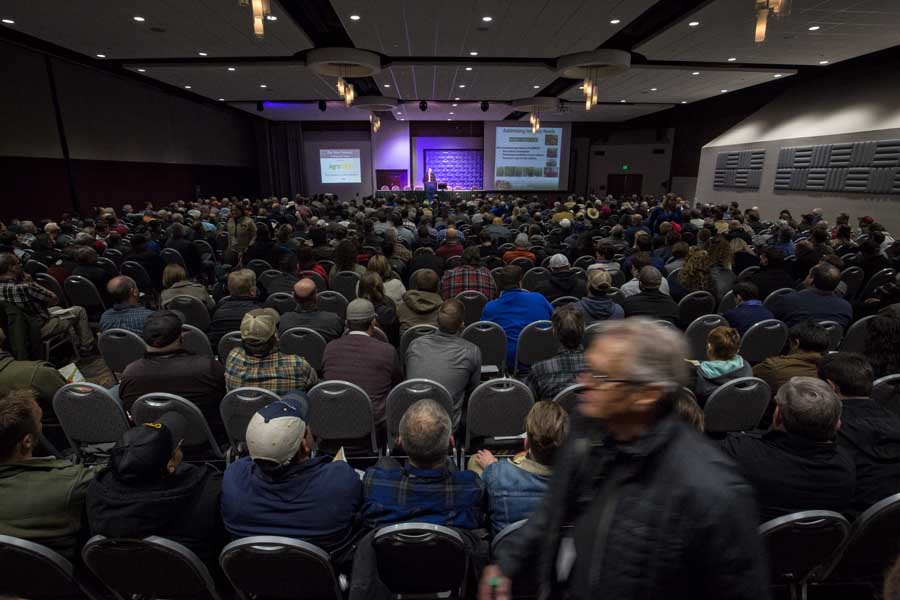 Standing room only during the opening panel "Anticipating Changes" in the large conference hall. <b>(TJ Mullinax/Good Fruit Grower)</b>