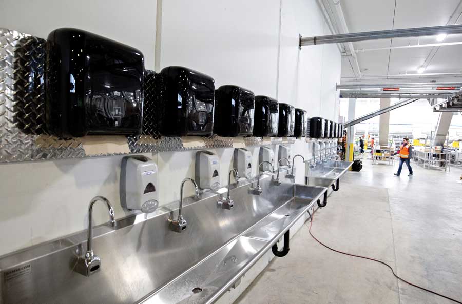 Employee washing stations and restrooms are centrally located between the cherry processing facility and future apple processing facility. <b>(TJ Mullinax/Good Fruit Grower)</b>