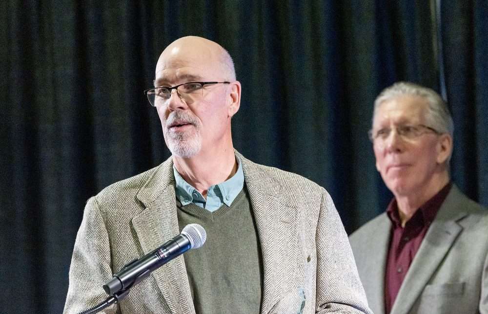 Mike Means, left, is honored with an Industry Service Award for his commitment and contributions to the Washington wine industry. (TJ Mullinax/Good Fruit Grower)