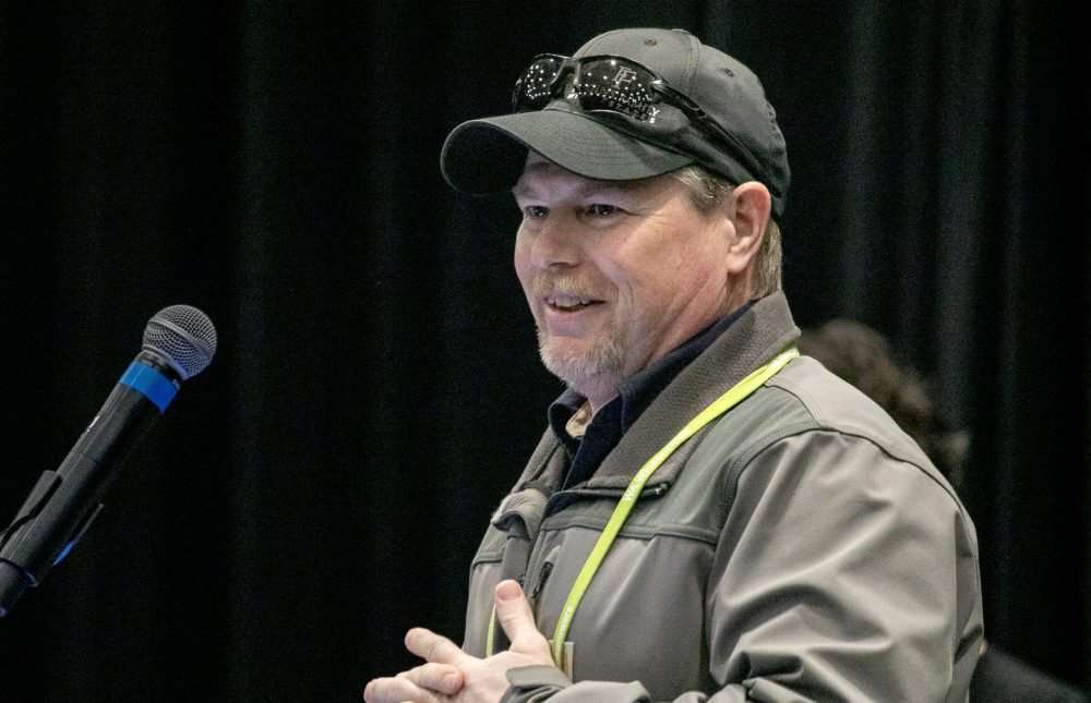 Jason Magnaghi, viticulturist for Figgins Family Wine Estates, accepts the Erick Hanson Memorial Grower of the Year Award at the 2025 Washington Winegrowers Association’s WineVit Convention and Trade Show in Kennewick, Washington, on Feb. 10. (TJ Mullinax/Good Fruit Grower)